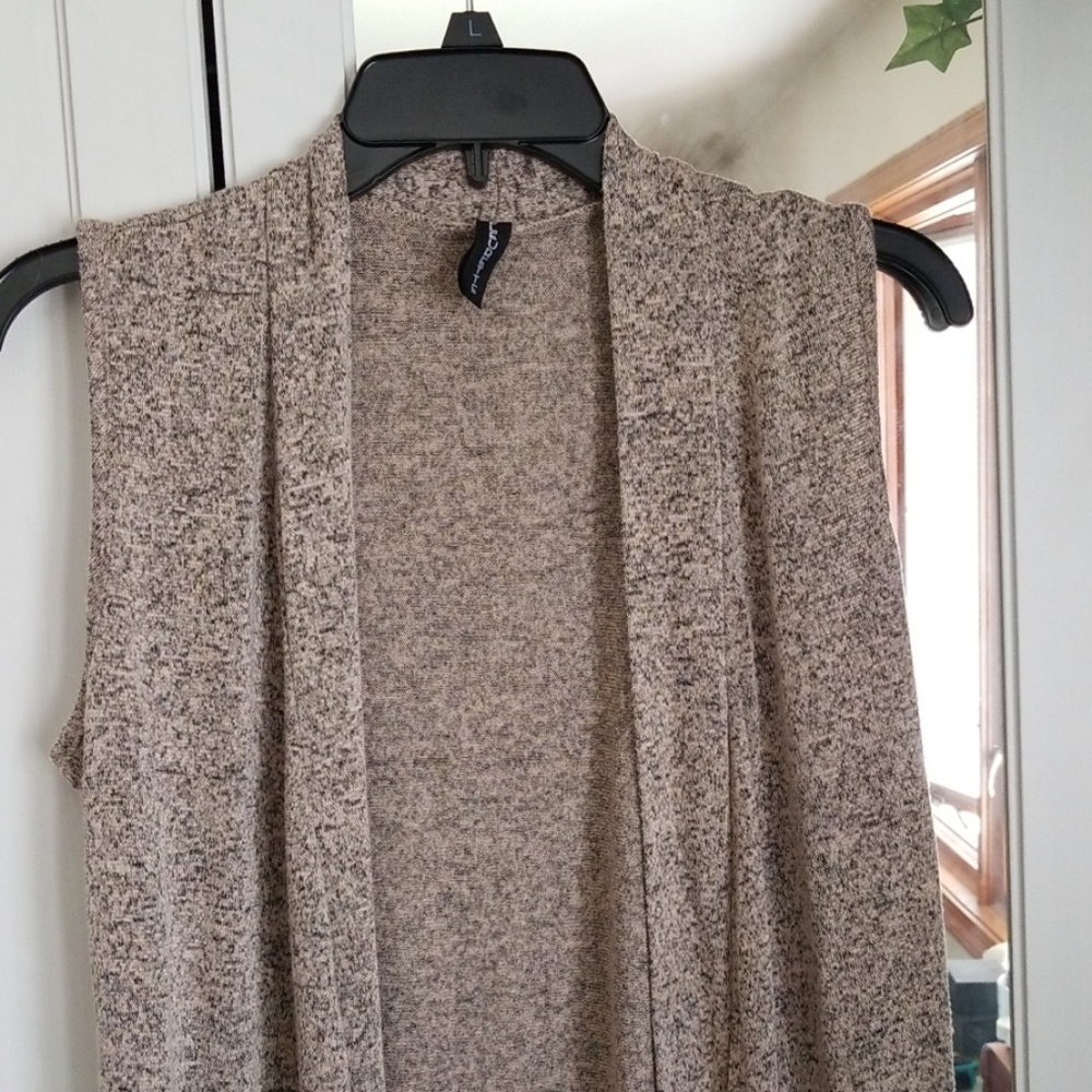 Long sleeveless sweater